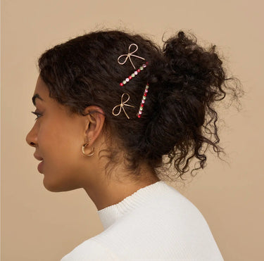 Kitsch Holiday Gemstone and Bow Bobby Pins 4 Piece Set with Red, Pink and Green Gemstones and gold bows.